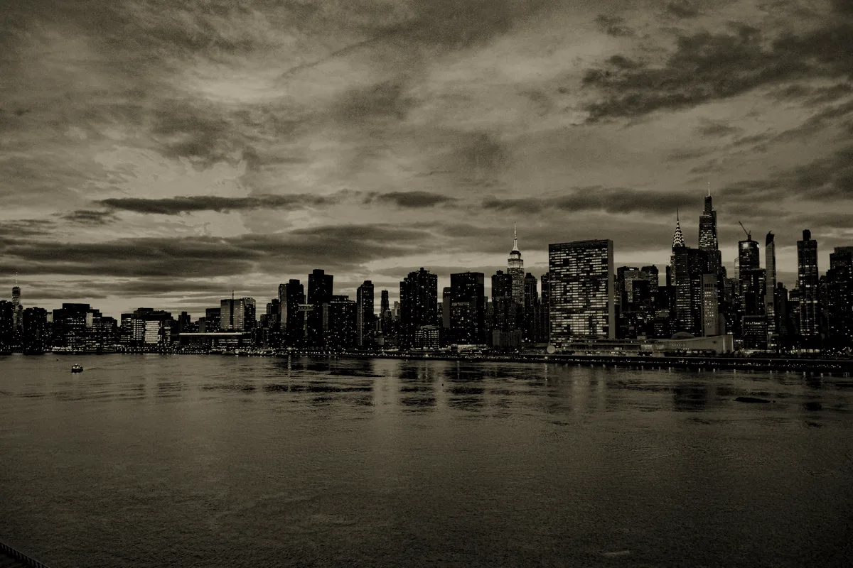 The Manhattan skyline at dusk, seen across the East River