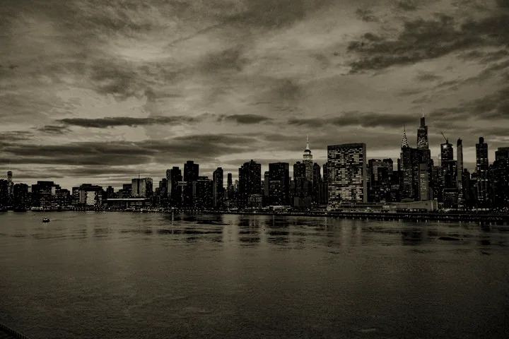 The Manhattan skyline at dusk, seen across the East River